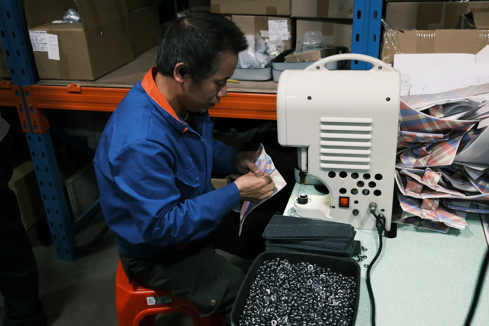 Founder walking the production line during a development consultation visit